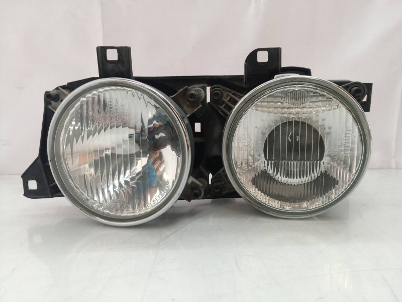 Recambio de faro izquierdo para bmw serie 7 (e32) referencia OEM IAM 13174100LI 1DL00590011 13174100LI