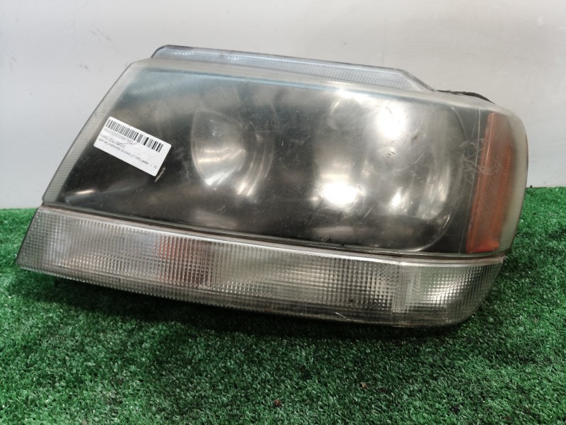 Recambio de faro izquierdo para jeep gr.cherokee (wj/wg) 2.7 crd laredo referencia OEM IAM   