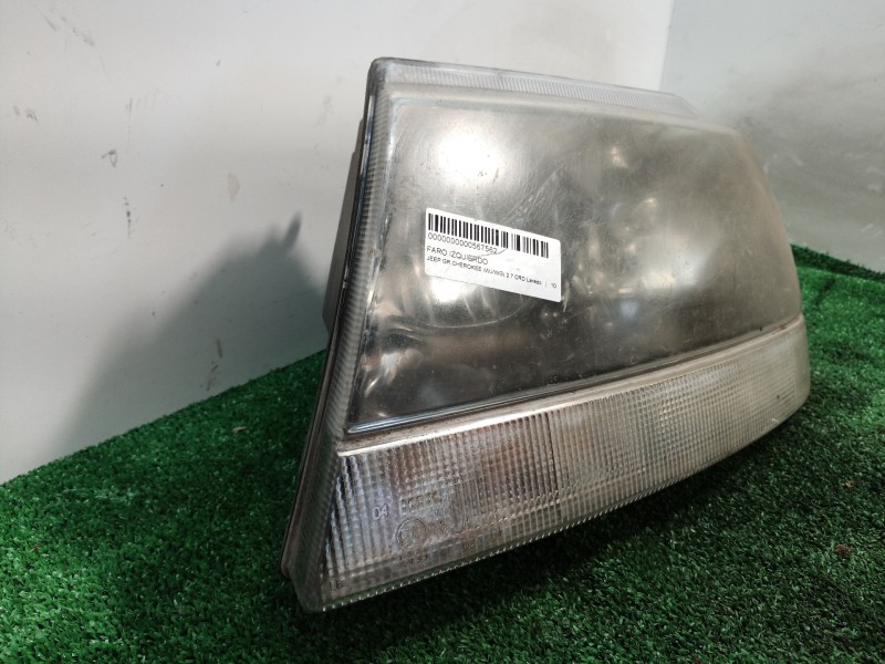 Recambio de faro izquierdo para jeep gr.cherokee (wj/wg) 2.7 crd laredo referencia OEM IAM   