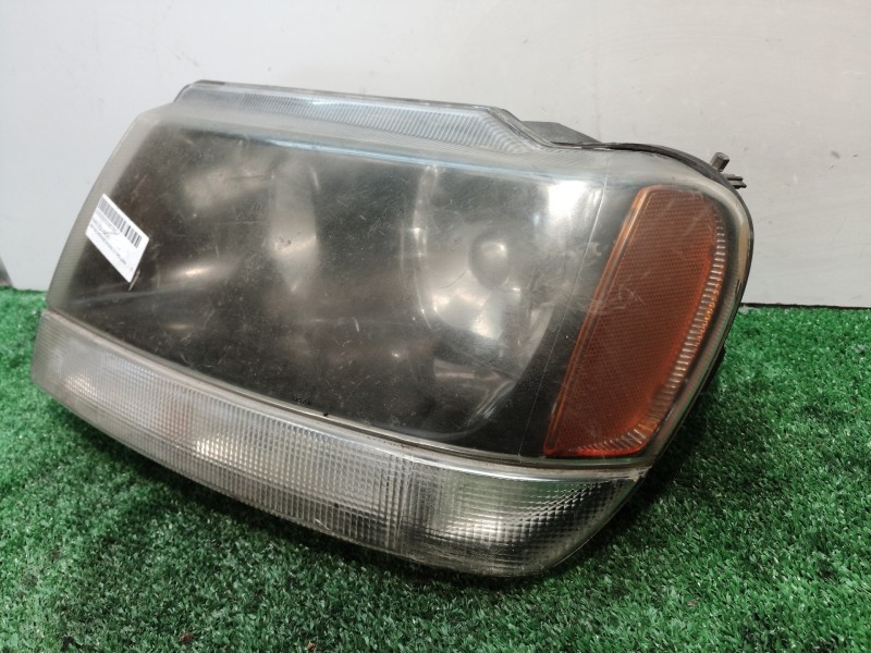Recambio de faro izquierdo para jeep gr.cherokee (wj/wg) 2.7 crd laredo referencia OEM IAM   