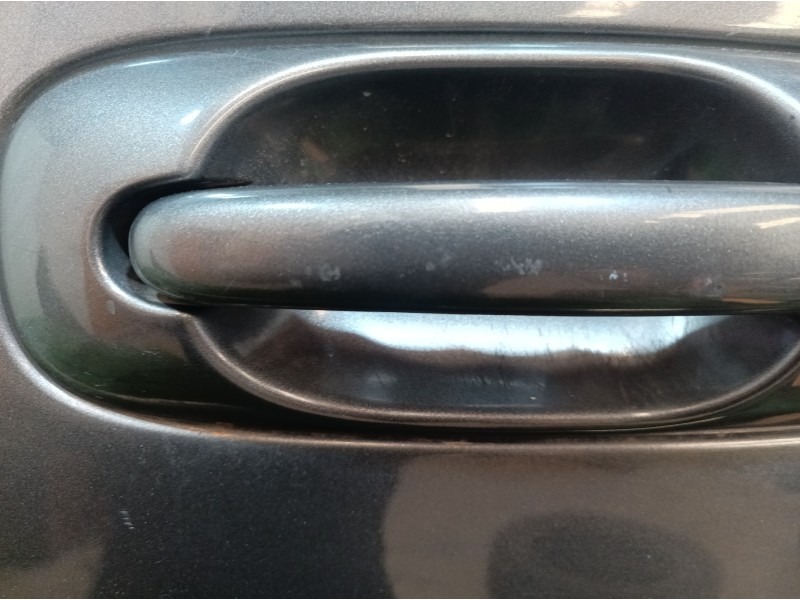 Recambio de puerta delantera izquierda para chrysler grand voyager limited referencia OEM IAM   