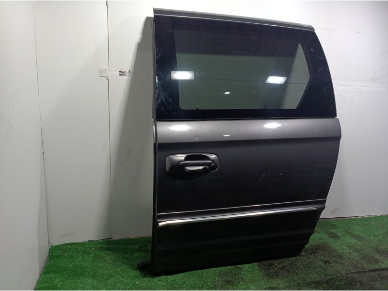 Recambio de puerta lateral corredera izquierda para chrysler grand voyager limited referencia OEM IAM   