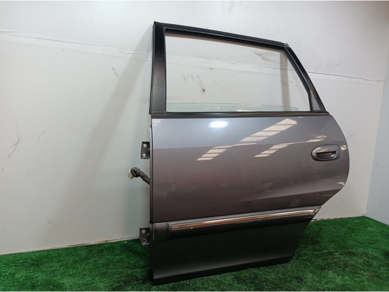 Recambio de puerta trasera izquierda para kia carens 2.0 turbodiesel cat referencia OEM IAM   