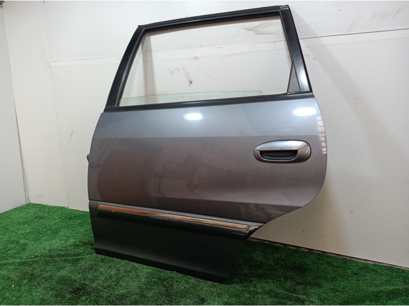 Recambio de puerta trasera izquierda para kia carens 2.0 turbodiesel cat referencia OEM IAM   