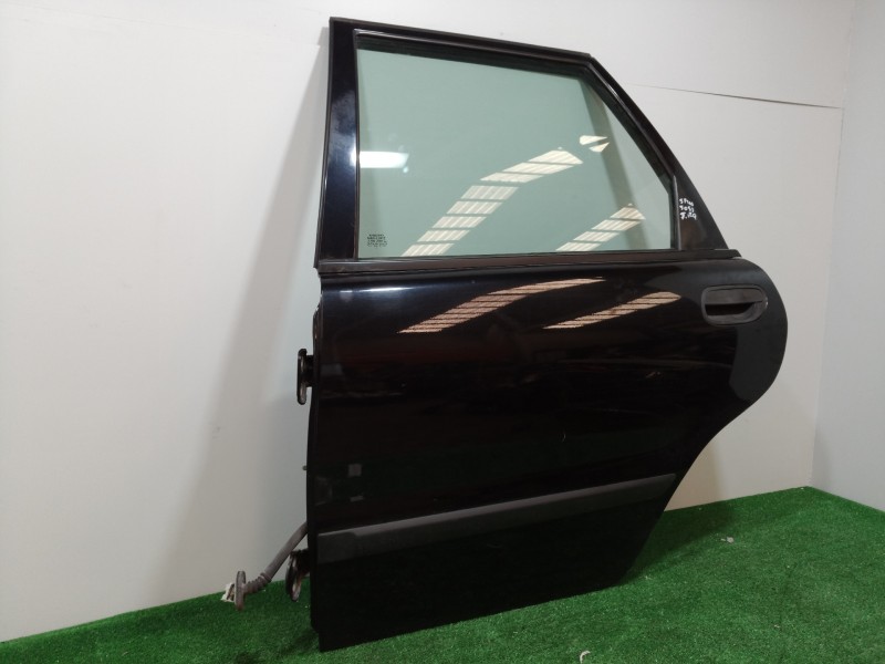 Recambio de puerta trasera izquierda para volvo v40 familiar 1.9 d referencia OEM IAM   