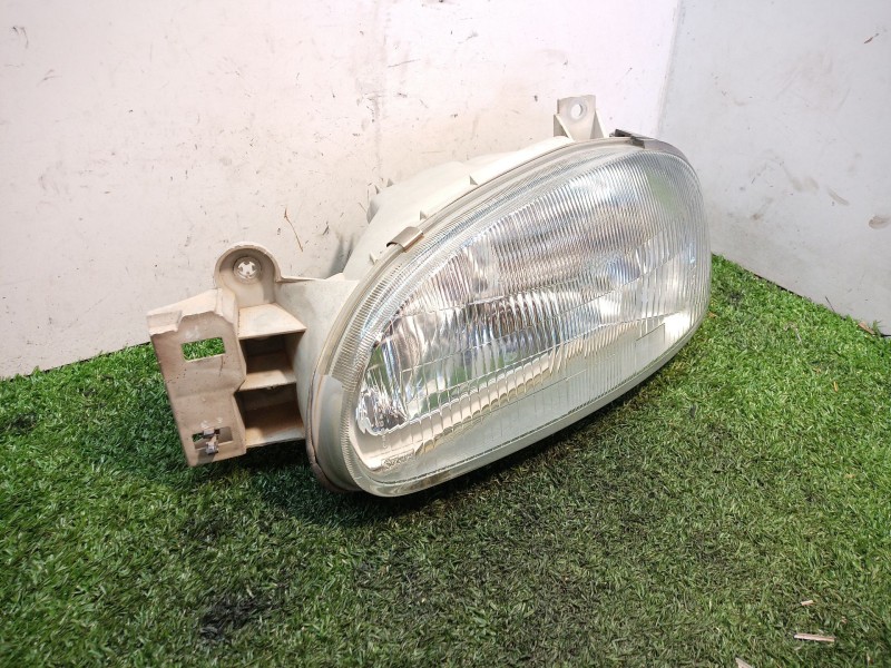 Recambio de faro izquierdo para mazda 121 (db) l referencia OEM IAM   