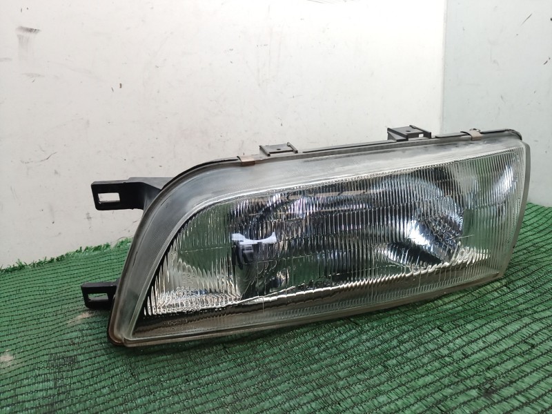 Recambio de faro izquierdo para nissan almera i (n15) 1.6 referencia OEM IAM   