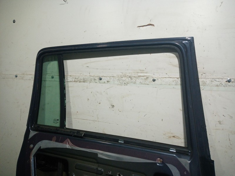 Recambio de puerta trasera izquierda para opel zafira b 1.6 16v referencia OEM IAM   