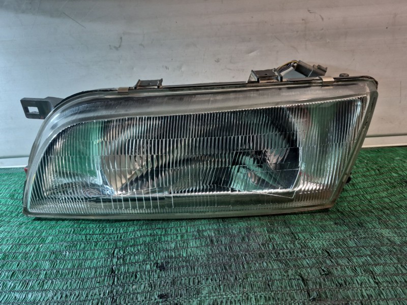 Recambio de faro izquierdo para nissan almera (n15) 1.4 16v cat referencia OEM IAM   